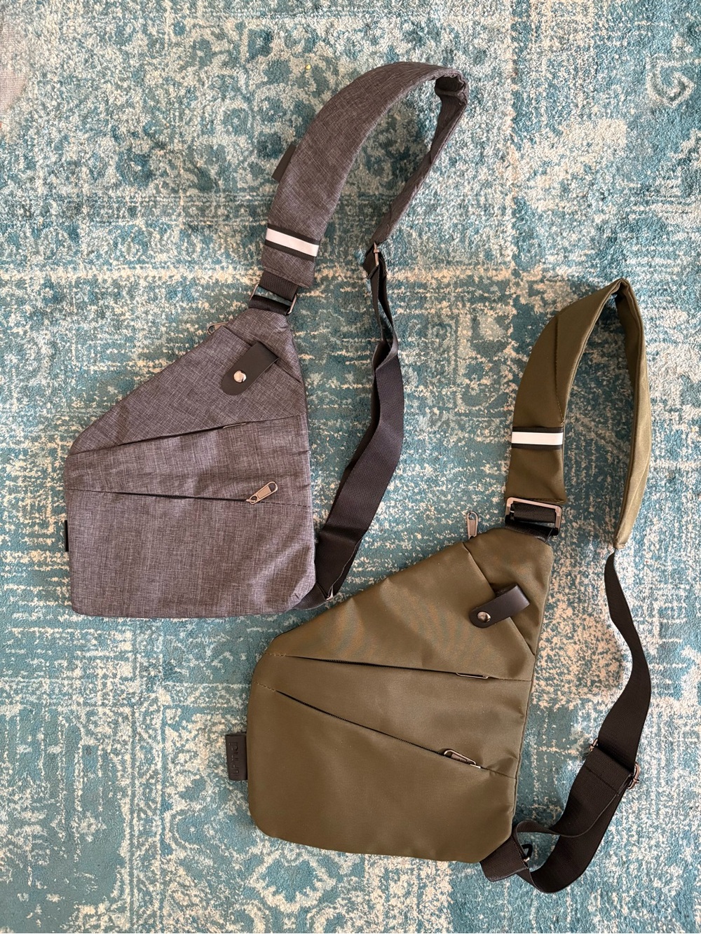 TWO CROSSBODY TRAVEL BAGS